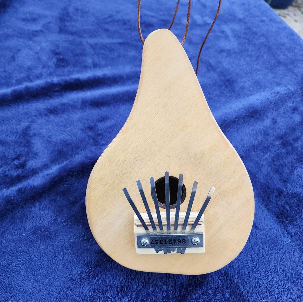 Kalimba half gourd instrument
